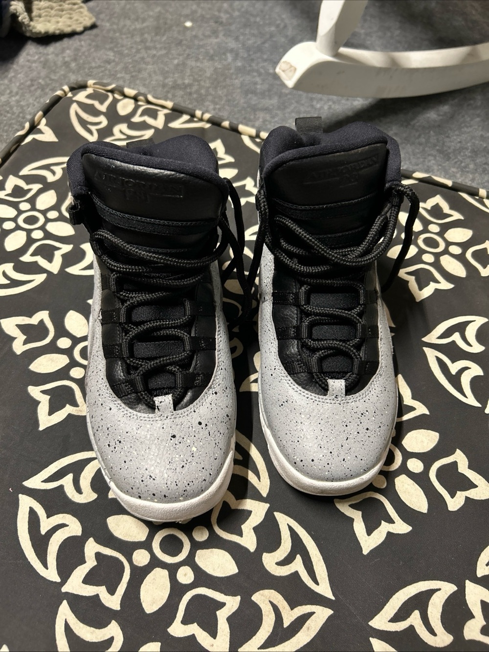 Air Jordan’s cement gray High-Top Sneakers